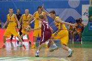 Sviatoslav Mykhailiuk of Ukraine competes during the U16 Eurobasket 2013 first-round match between Ukraine and Latvia at Palace of Sport in Kiev, Ukraine, on Aug. 8, 2013.