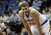 The Knicks’ Cole Aldrich takes a breather in New York’s game against the Timberwolves in this photo from March 5 in Minneapolis.