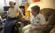 Ron Light sits with his sister Sue Richardson who spends a lot of time with Ron at Pioneer Ridge. Light moved from Albuquerque to Lawrence to be closer to his sister.