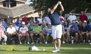 Former Kansas University golfer Gary Woodland demonstrates a tip during a clinic for junior golfers on Monday, June 16, 2014, at Alvamar.