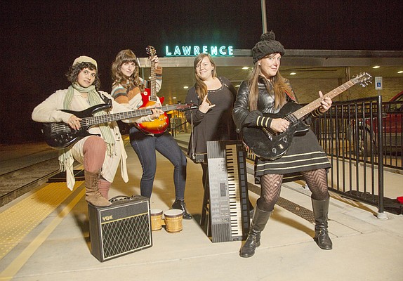 From left, Monica George, Angie Schoenherr, Sally Sanko and Kelly Nightengale are the founding members of Girls Rock! Lawrence, a group that aims to empower girls through music.