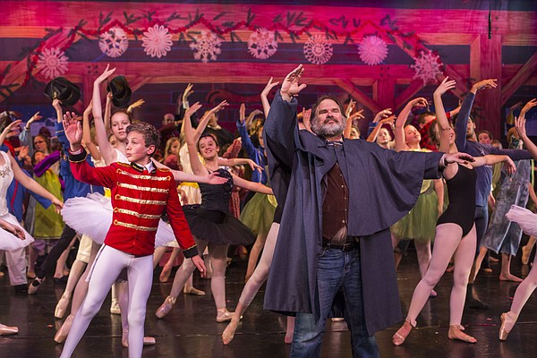 Ric Averill, who portrays Hugh Cameron, leads performers through the finale during a dress rehearsal for the upcoming Kansas Nutcracker, Tuesday, Dec. 9, 2014 at the Lawrence Arts Center.