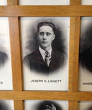 The photo of former KU student Joseph C. Liggett is among 129 photos of KU students and alumni who gave their lives in service to World War I, displayed on the sixth floor of the Kansas Union. Ray Liggett of Shawnee stumbled upon his great uncle's connection to KU and the war while doing genealogical research, but didn't previously know the Union was a memorial to him and other casualties. Ray Liggett said he learned that Joseph Liggett enlisted in October 1918 and died the next month. He was a member of KU's unit of the Student Army Training Corps but died in Lawrence in the influenza epidemic before he was ever deployed.