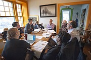 Members of Justice Matters' executive committee discuss budgetary items and research updates. Pictured are, clockwise from lower left, Rev. Mary Newberg Gale of First Presbyterian Church, Rev. Randall Weinkauf of Immanuel Lutheran Church, Rev. Justin Jenkins of Velocity Church, Rev. Verdell Taylor of St. Luke African Methodist Episcopal Church, organizer Ben MacConnell, Father Mike Scully of St. John of the Evangelist Church, Rev. John McDermott of Morning Star Church and Rev. Kathy Williams of First United Methodist Church. 