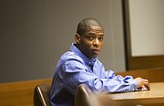 Dustin D. Walker in Douglas County District Court during his first trial in the death of Lawrence resident Patrick Roberts.
