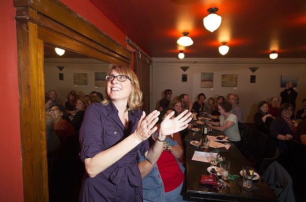 Lawrence City Commission candidate Leslie Soden watches as the results of the election come in on Tuesday, April 7, 201,5 during Soden's watch party at Merchant's Pub and Plate, 746 Massachusetts. Soden was the top vote-getter in the general election with 6,131 votes.