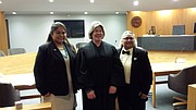 Mattisa Harrison (left), Judge Kay Huff and Darla Harrison pose for a photo after Mattisa and Darla were married by Huff March 25, 2015, at the Douglas County Courthouse.