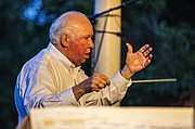 Bob Foster conducts the Lawrence City Band during their concert at South Park on Wednesday, July 8, 2015.