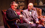 Sherlock Holmes, left, portrayed by Robert Brand, and Dr. Watson, portrayed by Michael Rapport, discuss clues during a dress rehearsal for the upcoming Kansas Repertory Theatre production of "Sherlock&squot;s Last Case" on Tuesday evening at Crafton-Preyer Theatre in Murphy Hall. The show opens at 7:30 p.m. Friday.