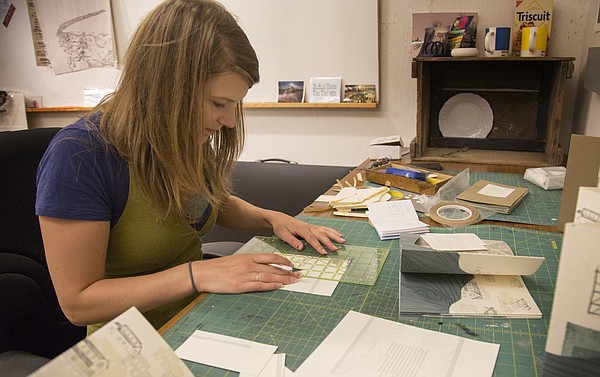 Amanda Maciuba, works in her studio at the Lawrence Arts Center, where she is the 2015-2016 printmaking artist-in-residence. 