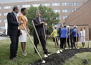 From left, Douglas A. Girod, M.D., executive vice chancellor of KU Medical Center, KU Chancellor Bernadette Gray-Little and Kansas Governor Sam Brownback visit Aug. 27, 2015, during a ceremonial groundbreaking at the University of Kansas Medical Center for its $75 million Health Education Building, which will serve as the primary teaching facility for the KU schools of Medicine, Nursing and Health Professions.