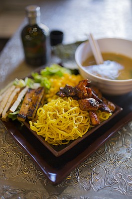 The Tsukemen at Ramen Bowls consists of buttered corn and warm noodles, fresh scallions, dipping broth and tofu.