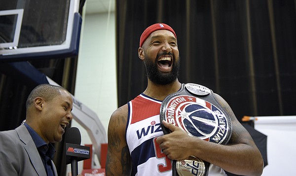 Washington Wizards' Drew Gooden III, right, reacts during a NBA basketball media day, Monday, Sept. 28, 2015, in Washington. (AP Photo/Nick Wass)
