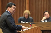 Kansas Solicitor General Steve McAllister, makes oral arguments before the full, 14-member, Kansas Court of Appeals in Topeka, Kan., Wednesday, Dec. 9, 2015. The lawsuit against a Kansas ban on a common second-trimester procedure has forced the state Court of Appeals to consider how much the state constitution protects abortion rights.
