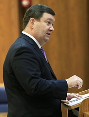 Kansas Solicitor General Steve McAllister makes oral arguments before the Kansas Supreme Court in Topeka, Kan., Thursday, Dec. 10, 2015. The high court heard arguments about a 2014 law that strips it of its authority to appoint the chief judges in the state's 31 judicial districts and gives it to local judges.