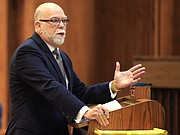 Attorney Pedro Irigonegaray makes oral arguments before the Kansas Supreme Court in Topeka, Kan., Thursday, Dec. 10, 2015. The high court heard arguments about a 2014 law that strips it of its authority to appoint the chief judges in the state's 31 judicial districts and gives it to local judges.