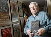 Grant Goodman, a longtime professor of history at Kansas University who died in 2014, is pictured at his home in Brandon Woods Retirement Community in this 2007 file photo. Goodman contributed a chapter to the book “Legacies of the Comfort Women of World War II" about his wartime translation work for the U.S. Army that documented Japanese military brothels. That report is now archived at KU&squot;s Spencer Research Library.