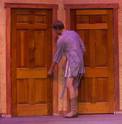 Bubba, played by Christian Johanning, searches the house for his girlfriend during a dress rehearsal for Theatre Lawrence's upcoming production of "Girls' Weekend" on Thursday, Jan. 14, 2016. The show opens on Jan. 22 with a curtain time of 7:30 p.m. at Theatre Lawrence, 4660 Bauer Farm Dr.