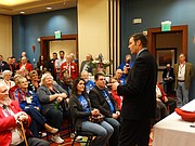 Kansas Secretary of State Kris Kobach rallied fellow Republicans at the party&squot;s state convention, calling the American Civil Liberties Union and the League of Women Voters "communists," and urging them to vote against retaining five Kansas Supreme Court justices.