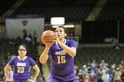 Haskell Indian Nations University basketball player Keli Warrior (15) shoots free throws during Wednesday's NAIA tournament game against Dakota Wesleyan at the Tyson Events Center in Sioux City, Iowa.