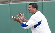 Kansas University special-teams coach Joe DeForest encourages his players during Tuesday's practice.
