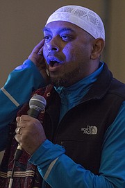Jameel Syed recites the Islamic call to prayer after speaking about building interfaith relationships Sunday morning at Trinity Lutheran Church, 1245 New Hampshire St. In 2015, Syed, a Muslim, became the first person to recite the Adhan, or Islamic call to prayer, along with the last sermon of the Prophet Muhammad in all 50 states in only 35 days.