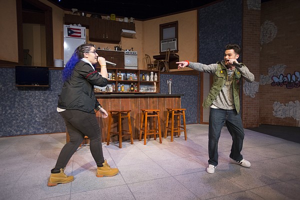DJs, Nelson Cardenal, played by Bronwen Capshaw, left, and Trip Goldstein, played by Nathan Kruckenberg rap during a dress rehearsal for Welcome to Arroyo's, Wednesday in the William Inge Memorial Theater at Murphy Hall.