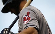 The Cleveland Indians logo is emblazoned on Ryan Raburn's jersey as he prepares for an at-bat during a baseball game against the Baltimore Orioles, Friday, June 26, 2015, in Baltimore. (AP Photo/Patrick Semansky)
