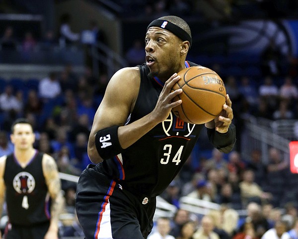 Los Angeles Clippers forward Paul Pierce looks for an open shot against the Orlando Magic during the first half of an NBA basketball game, Friday, Feb. 5, 2016, in Orlando, Fla. (AP Photo/John Raoux)