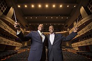 Identical twin brothers Stephen Tucker, left, and Paul Tucker, both conductors, will both conduct at Saturday's University of Kansas School of Music Scholarship Concert at the Lied Center. Paul Tucker is director of choral activities and associate professor of music in the School of Music at KU. Stephen Tucker is director of orchestras and associate professor of music at the Claire Trevor School of the Arts at University of California, Irvine.
