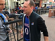 Kansas football coach David Beaty wore a Frank Mason III jersey in Kansas City, Mo., on March 9, 2017, prior to the KU basketball team's Big 12 quarterfinal versus TCU.