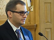 Travis Couture-Lovelady, a former legislator who now lobbies for the National Rifle Association, argues before a House committee, alleging the University of Kansas and other Regents institutions are enacting unreasonable regulations to circumvent a new law that requires them to allow people to carry concealed weapons on campus.