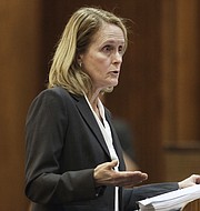Janet Crepps, senior counsel for the Center for Reproductive Rights, argues before the Kansas Supreme Court Thursday, March 16, 2017, on behalf of Kansas City-area physicians Herbert Hodes and Traci Nauser for an independent recognition of the right of Kansas women to terminate a pregnancy and to affirm the district court's injunction putting the law on hold pending trial. (Thad Allton/The Topeka Capital-Journal via AP, Pool)
