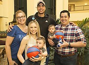 Landen Lucas is pictured with his mother Shelley Lucas, Meredith and Ian Sadler of Tulsa, and their twin, ten-month-old boys, Landon and Lucas Sadler, who were named after the Kansas forward. The group is pictured on Saturday, March 18, 2017 at the Renaissance Hotel in Tulsa, Okla.