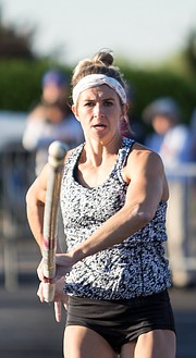 Kristen Hixson sprints up the runway in the Kansas Relays' Street Pole Vault event on Thursday. Hixson took first place in the women's event.