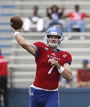 Kansas junior quarterback Peyton Bender throws during the spring game, on Saturday, April 15, at Memorial Stadium.