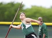 Free State's Nathan Spain motions to throw on his first attempt during the 6A Regionals on Thursday, May 18, 2017 at Free State High School.