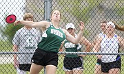Free State's Caylee Irving throws during the Girls Discus event of the 6A Regionals on Thursday, May 18, 2017 at Free State High School.