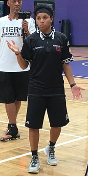 Former Kansas women's basketball star Angel Goodrich instructs Native Top 50 campers at Coffin Complex on the campus of Haskell.