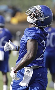 Kansas sophomore receiver Daylon Charlot looks back as he prepares to catch a fade pass in the team's second practice of fall camp on Tuesday, Aug. 1, 2017.