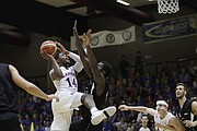 Kansas guard Malik Newman goes for the basket during an exhibition game between KU and an Italian selection of players, in Seregno, near Milan, Italy, Saturday, Aug. 5, 2017.