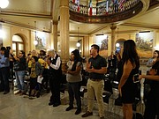 About two dozen people, including some so-called "dreamers," undocumented immigrants who were brought to the U.S. as children, rally at the Statehouse Friday in support of an Obama-era policy known as DACA that allows those dreamers to stay in the country without facing deportation. Kansas Attorney General Derek Schmidt and officials in nine other states are threatening a federal lawsuit if President Donald Trump does not repeal DACA by Tuesday, Sept. 5.
