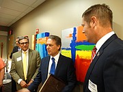 Lt. Gov. Jeff Colyer, center, talks with Ottawa City Commissioner Mike Skidmore, left, and attorney Brandon Jones, right, following an Ottawa Area Chamber of Commerce "Eggs and Issues" breakfast Wednesday at Ransom Memorial Hospital.