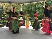 Raghsidad dancers perform a Middle Eastern dance at the annual Festival of Cultures Sunday afternoon in South Park.