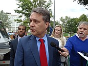 Lt. Gov. Jeff Colyer, who is expected to become governor soon, speaks with reporters outside the Statehouse on Wednesday, Sept. 27.