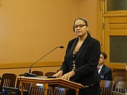 Claudette Humphrey, who runs a program for Catholic Charities of Northern Kansas that helps people get out from underneath high-interest payday loans, testifies before a special joint committee of the Kansas Legislature in favor of a bill that would put tighter limits on the interest rates and fees those lenders can charge.