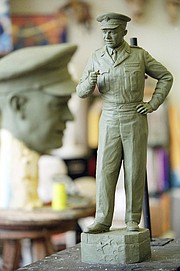 In this file photo from Aug. 23, 2001, a clay maquette of Dwight D. Eisenhower is seen in Lawrence before the sculpting of a 7 1/2-foot bronze statue by Lawrence artist Jim Brothers. Brothers made the sculpture of the former President and five-star general for the National Statuary Hall in the U.S. Capitol. A second 10-foot Eisenhower was sculpted for the National D-Day Memorial in Bedford, Va. The clay bust for the 10-foot version is visible in background at left.