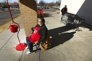 Salvation Army bell ringer Lisa Branch rings from her post on Tuesday, Dec. 12, 2017 at Dillons, 3000 W. Sixth St. Donations to the Salvation Army are reportedly down for the season.