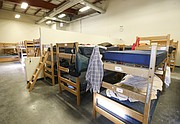 The majority of the beds in the men's sleeping dorm at the Lawrence Community Shelter were occupied on Wednesday, Jan. 17, 2018.