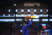 Kansas sophomore guard Malik Newman fires a shot during pre-game warmups prior to Saturday's game against Baylor at Allen Fieldhouse.